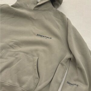Essentials fear of god cream hoodie great condition and clean. Size small
